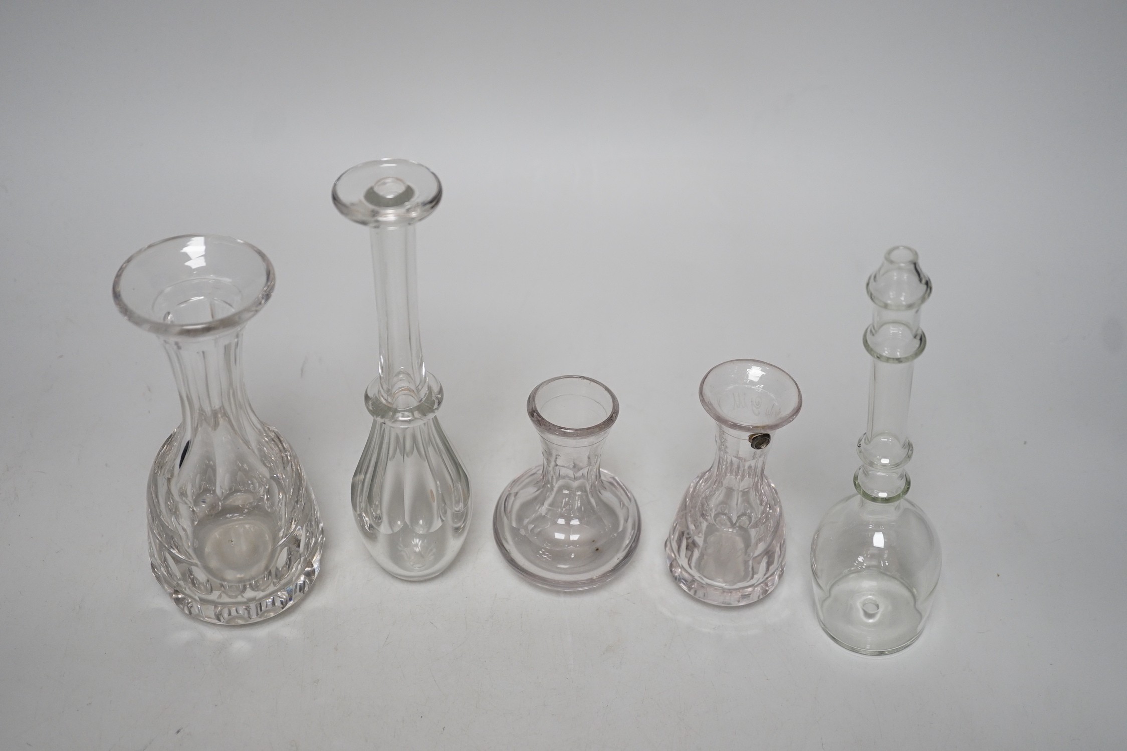 Three 19th century glass measures and two toddy lifts (5), tallest 19cms high